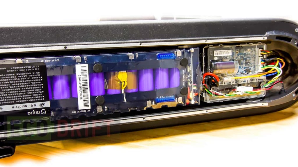 a close up of a computer case with a battery