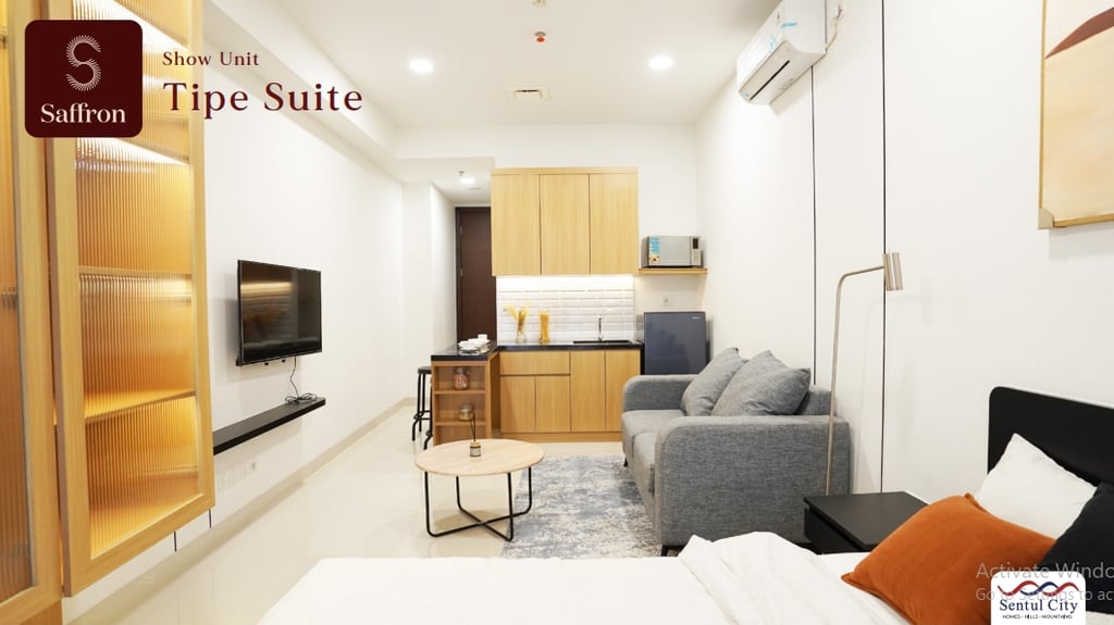 a living room with a couch and a television