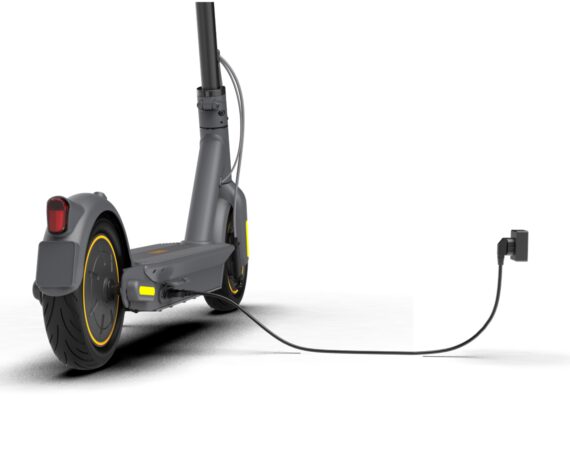 a scooter with a plugged in the middle of it