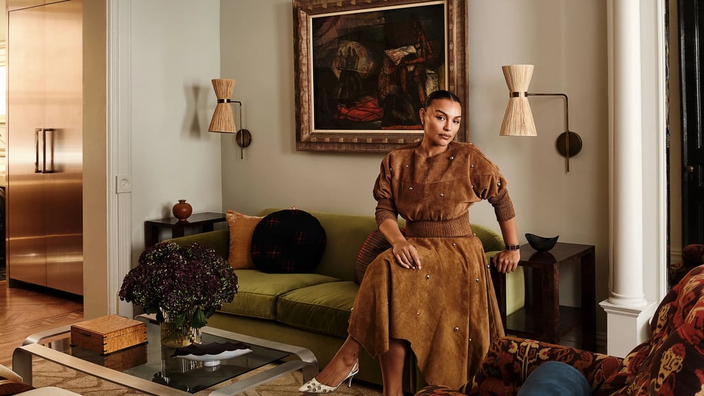 Paloma Elsesser posing in her chic living room.