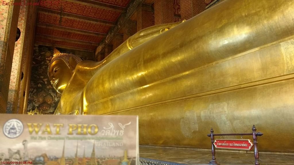 Reclining Buddha statue at Wat Pho temple in Bangkok, a famous cultural landmark