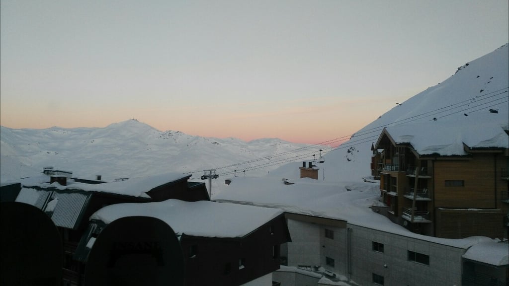 Alpine evening atmosphere around the Val Thorens snow front with mountain views