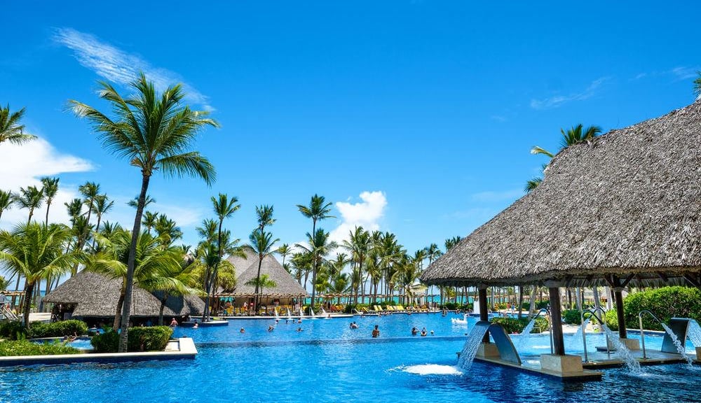 Luxury adults-only resort with pool and palm trees in Punta Cana