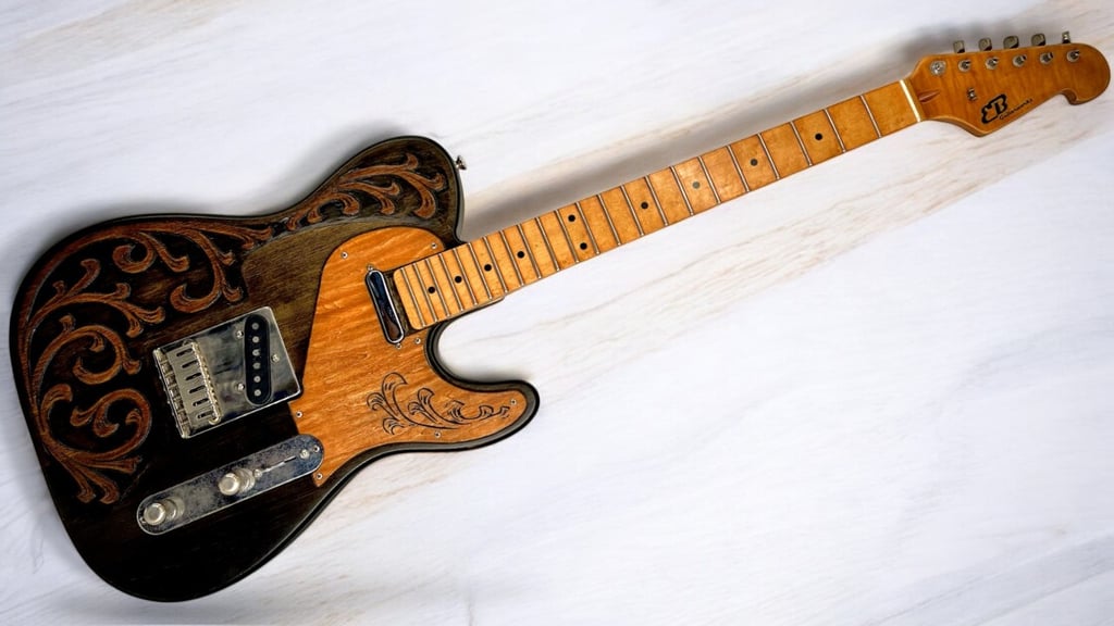 a guitar player's guitar with hand carved scroll work