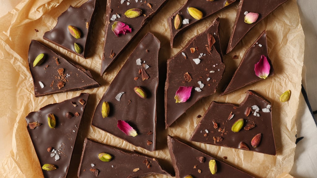 a chocolate bar with chocolate chips and pistal