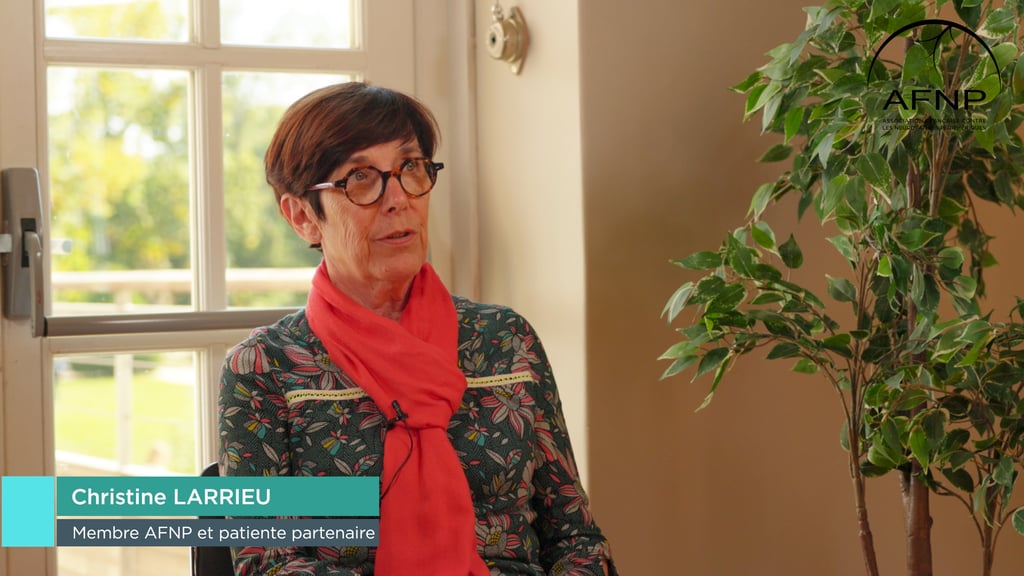 a woman in a red scarf and glasses