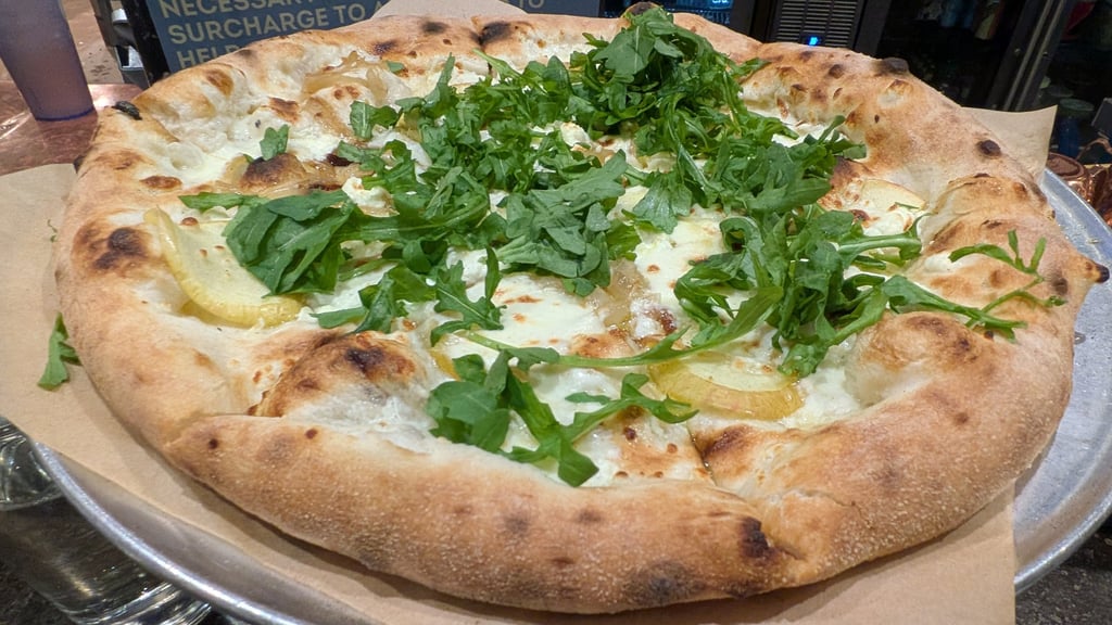 gourmet pizza with arugula