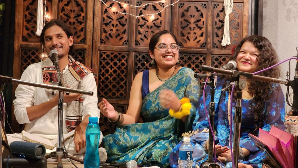 Kartik Goyal and Yashasvi Gupta, ghazal singers at either end, Simran Khurana, a Hindi and Urdu poet