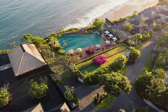Bvlgari resort a large pool with a view of the ocean