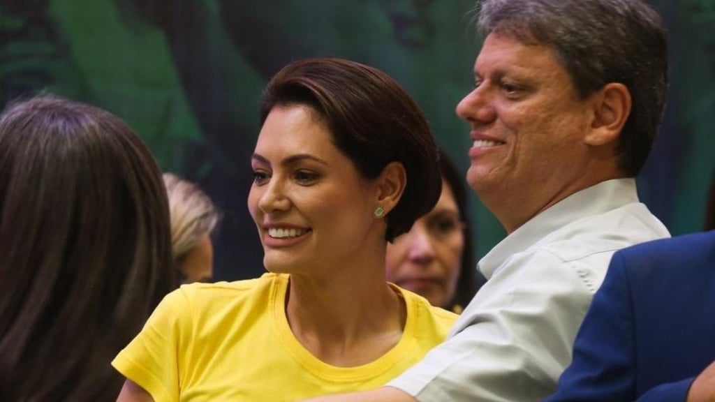 a man and woman smiling and laughing