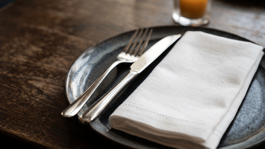 A considered fine dining place setting