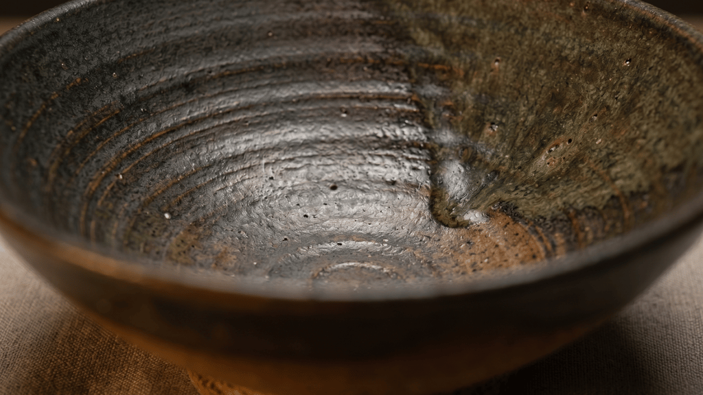 Textured earth-tone tableware styled for 2025