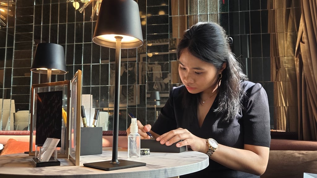 Live hot foiling personalization by Handwritten by Belle for an NYC product launch.