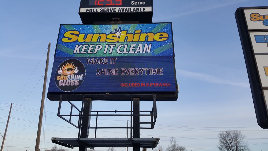 A billboard with the sign saying "keep it clean"
