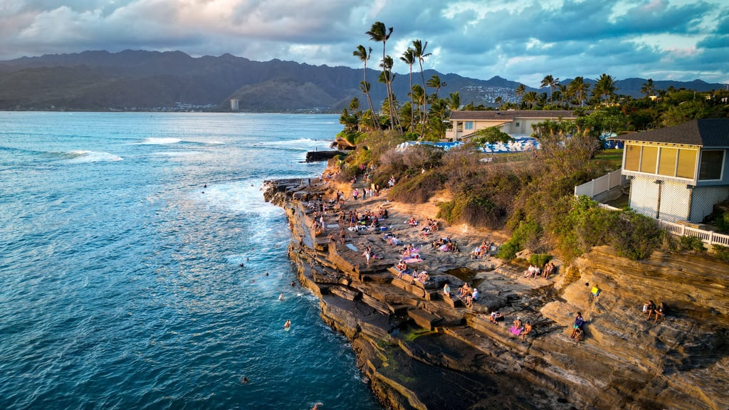 a beach with people on the beach