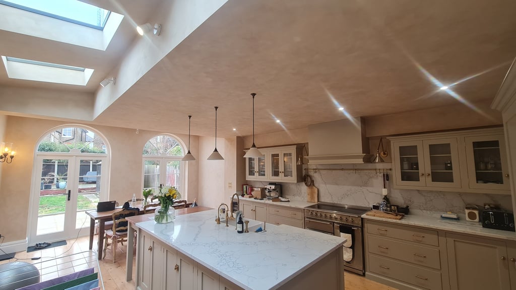 kitchen lighting LED downlights and layered lighting to enhance functionality. Installed in Lewisham by Easy Spark Ltd