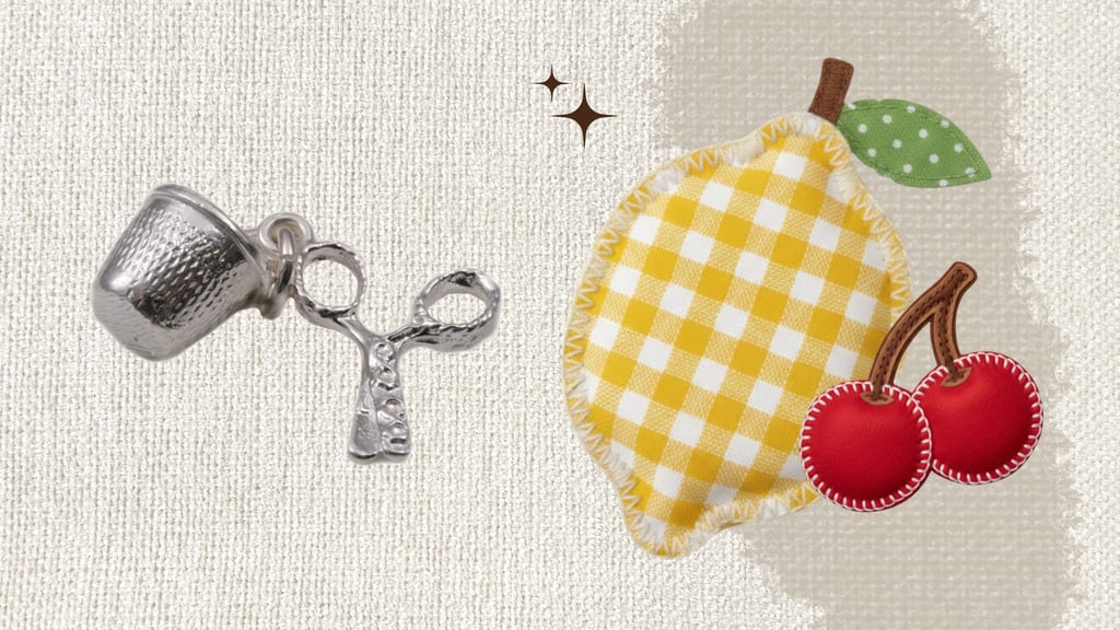 Silver thimble and scissors charm next to a yellow gingham lemon fabric patch.