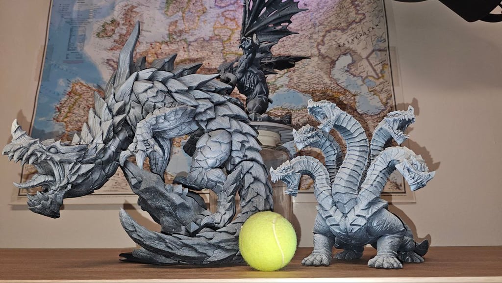 a tennis ball and a dragon on a table