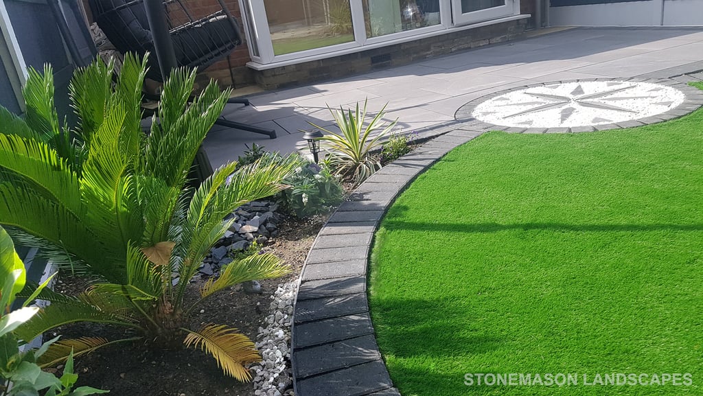 Exotic Modern Dynamic Designer Circle Lawn Tropical Small Garden