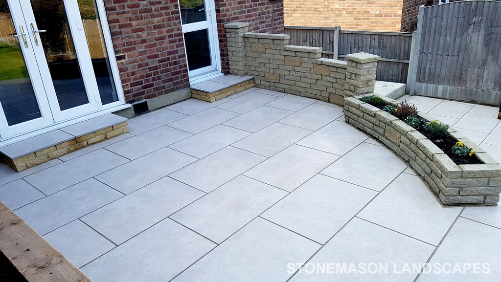 Elevated raised porcelain patio renovation and lawn levelling - Upminster 