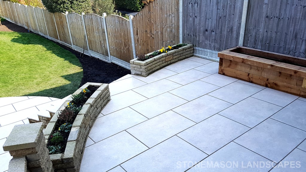 Elevated raised porcelain patio renovation and lawn levelling - Upminster 