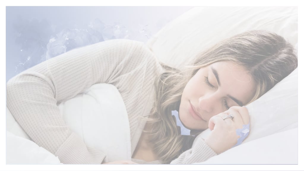 A peaceful woman sleeping soundly in a white bed with soft pillows for restorative deep sleep.