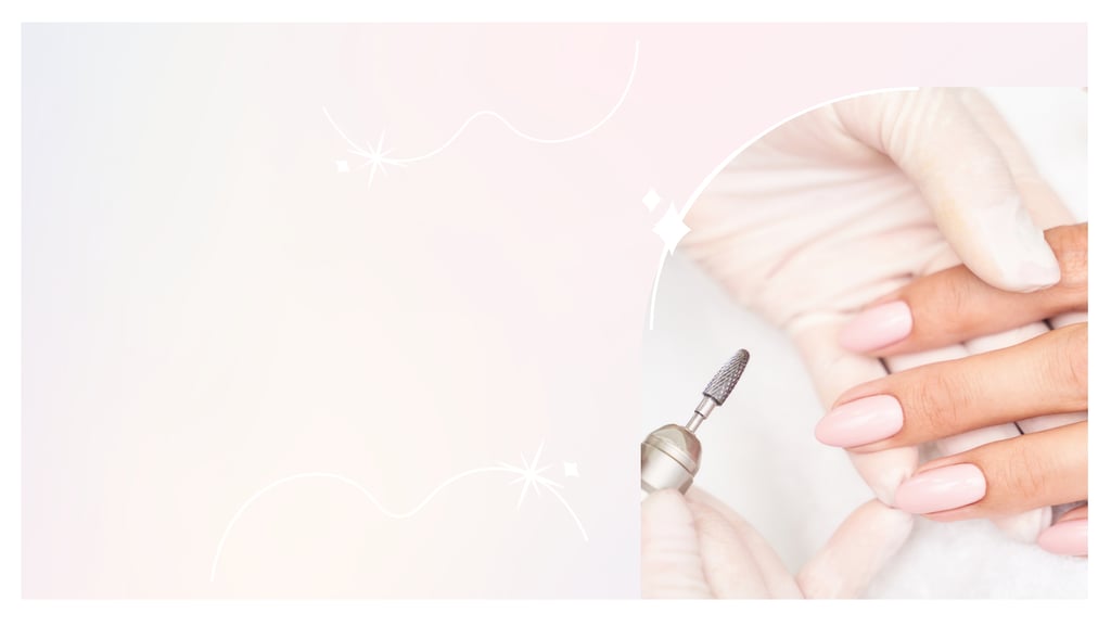 Professional nail technician using an electric nail drill on light pink manicured fingernails.