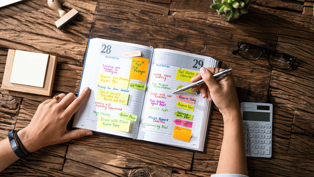 A woman checking her daily planner