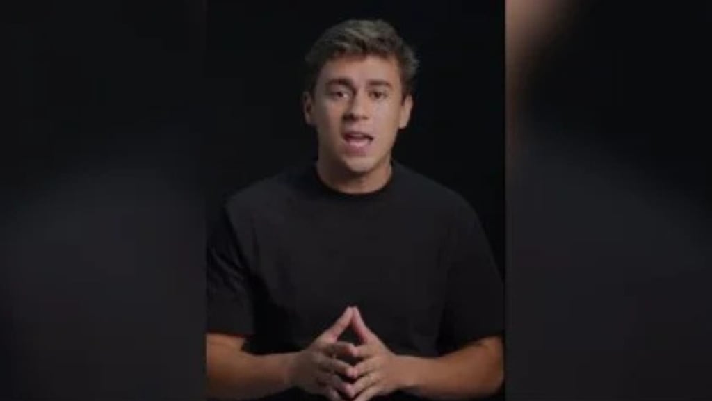 a man in a black shirt and black shirt