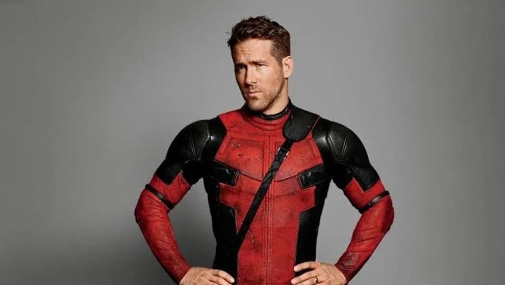 a man in a red and black suit with a red and black suit