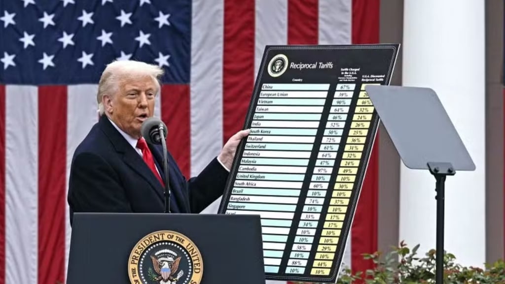 a man in a suit and tie standing at a podium with a microphone
