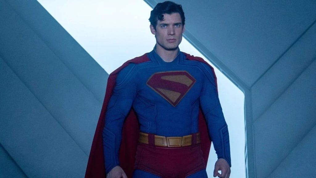 a man in a superman suit and a superman costume