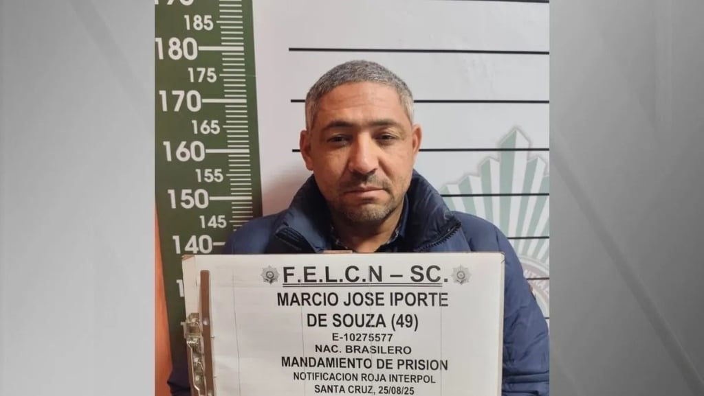 a man in a blue jacket is holding a sign that says,'feel like