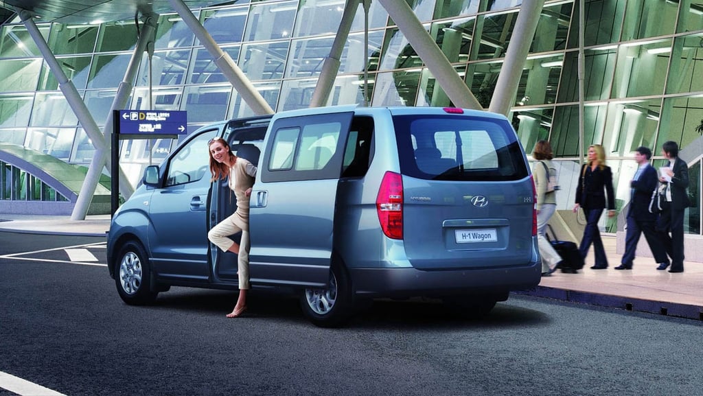 morocco renting car a woman is standing in front of a van