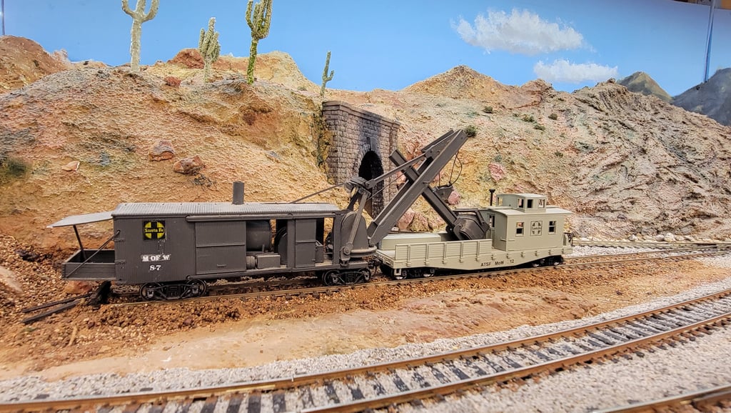 Maintenance of Way for Santa Fe Railroad. A steam driven crane and work train caboose.