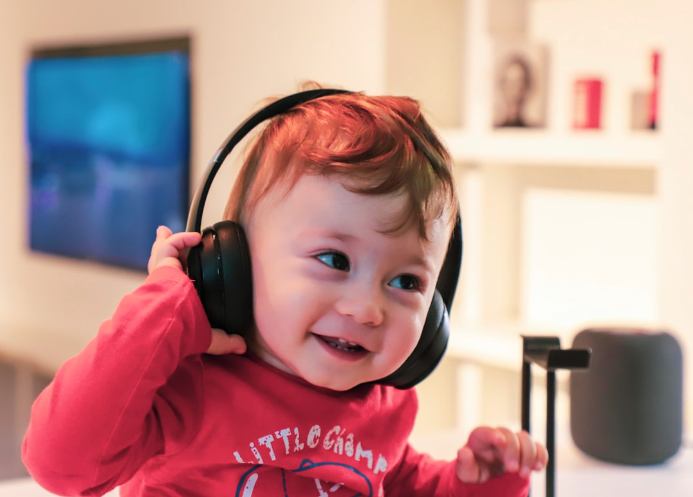 small child enjoying music therapy