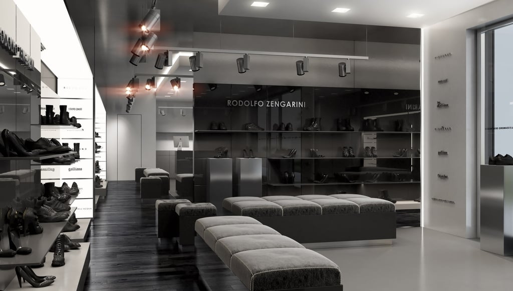  Dark-toned shoe/fashion store — "Rodolfo Zengarini" branding, black leather seating, spot lighting,