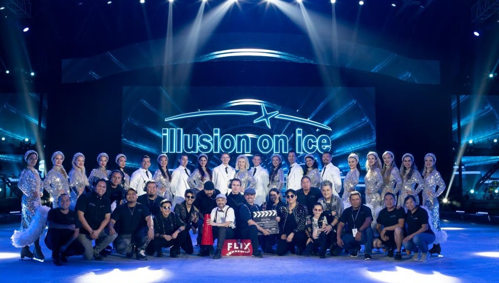 a group of people standing in front of a stage