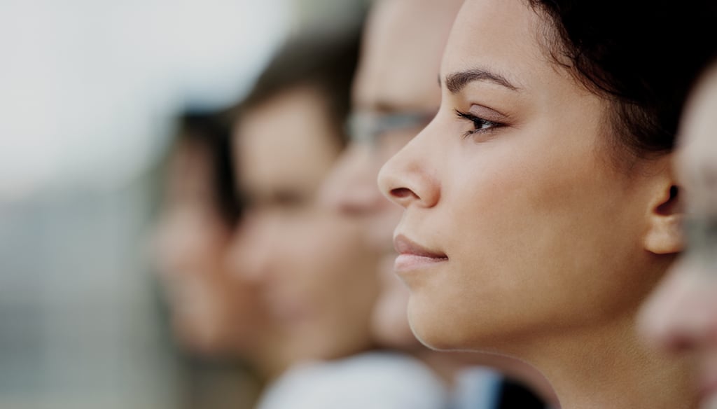 Profile of serious female student in the classroom.