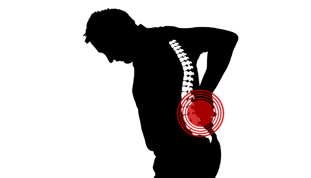 Image shows a man with an intense back pain, bending forward because of it