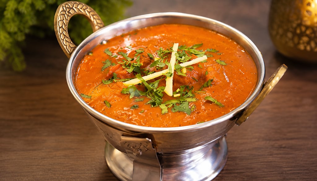 Vindaloo servido no Namastey India, prato indiano de Goa com molho intenso, especiarias aromáticas e