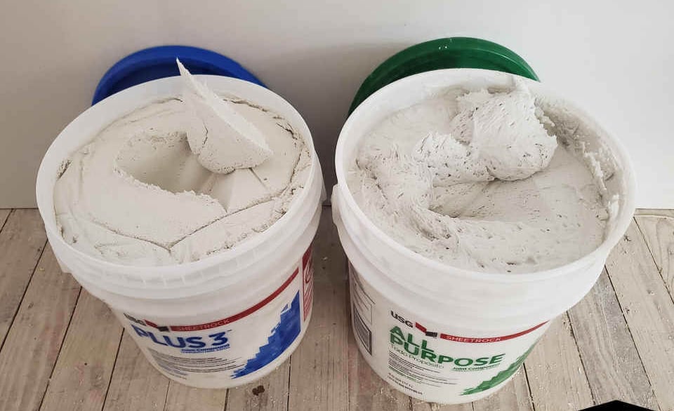 drywall compound in buckets