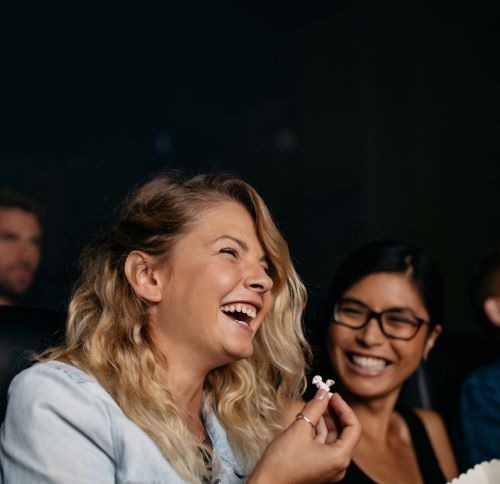 People enjoying a theater performance