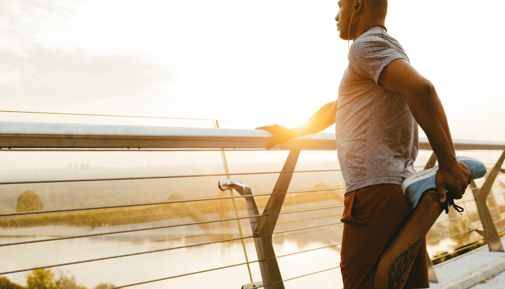 a man standing on a balcony railing railing railing