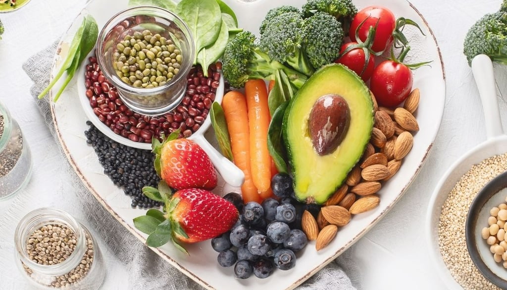 A Heart Shaped Plate With Vegan Food