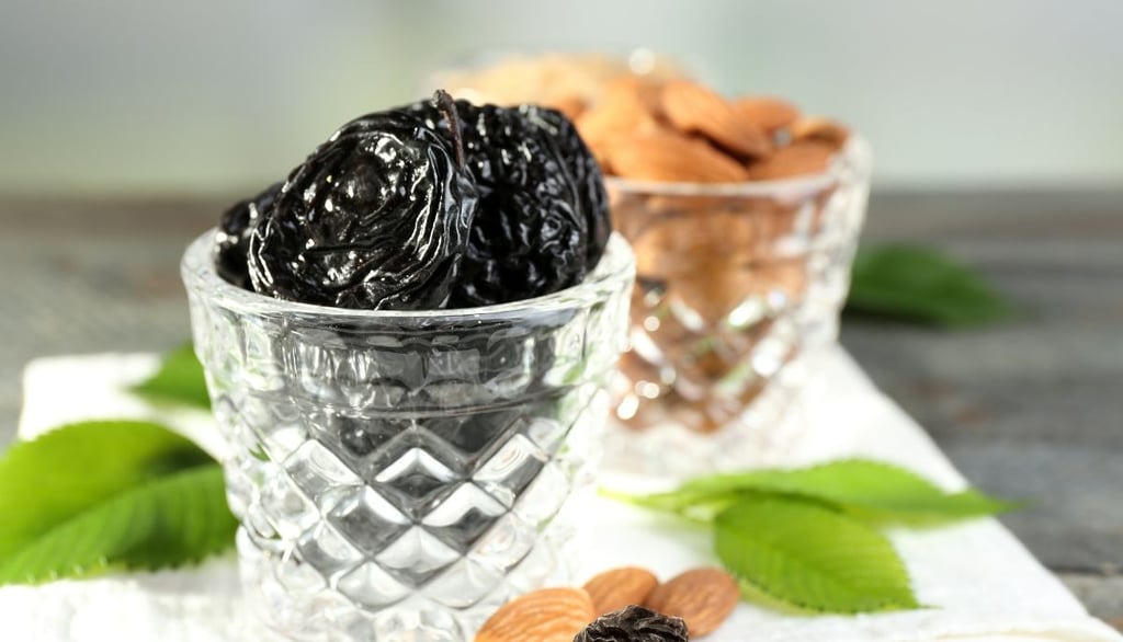 Prunes and almonds in galsses