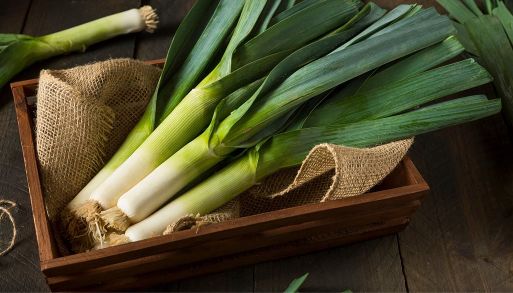 Leeks in a dish on a table in an old kitchen