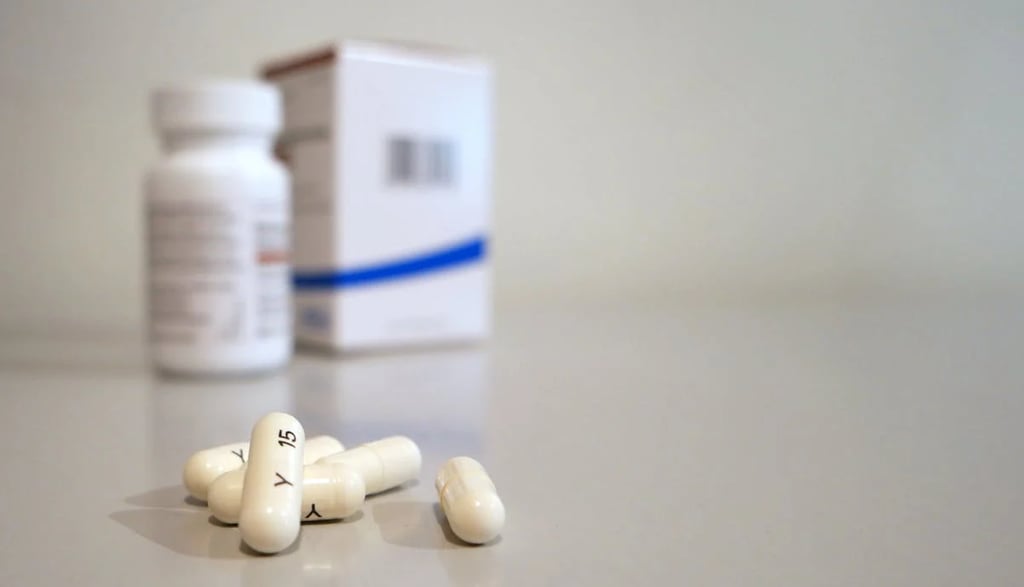 pills and pills on a table with a box of pills