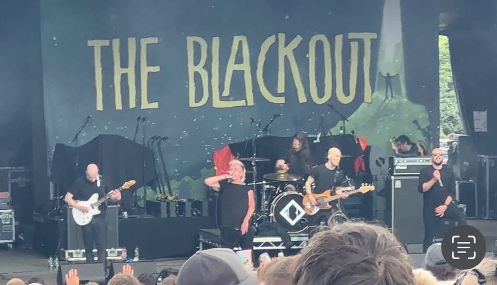 The Blackout band performing 