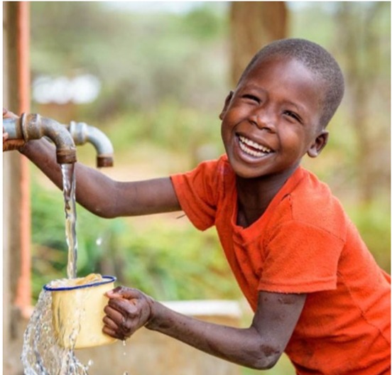 Luxeana Kenya for Sustainable water, a child on water tap